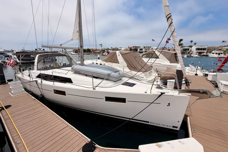 Slide: The Image of 2017 Beneteau Oceanis 41.1 sailboat docked at marina, showcasing sleek design and modern features. - 3