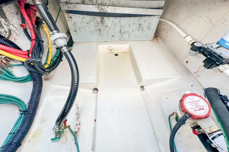 Slide: The Image of 2018 Pursuit C 260 Center Console boat wiring and plumbing details. - 56