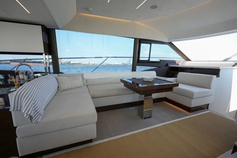 Slide: The Image of Luxurious interior of 2023 Prestige 590 yacht with elegant seating and ocean view. - 62