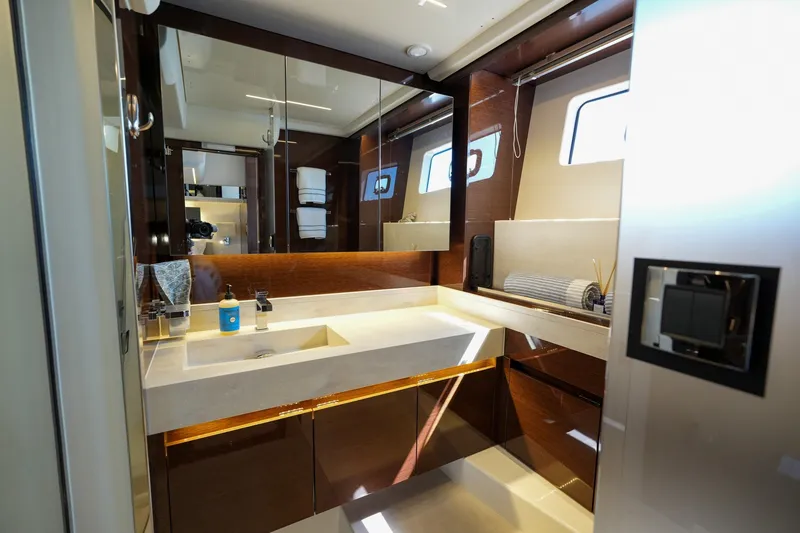 Slide: The Image of Luxurious bathroom interior of 2023 Prestige 590 yacht with modern fixtures and elegant design. - 96