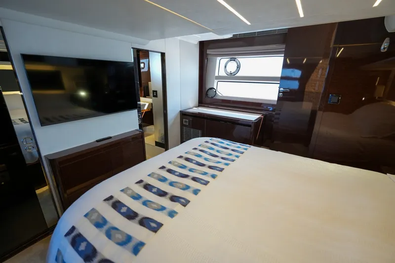 Slide: The Image of Luxurious interior of 2023 Prestige 590 yacht with modern amenities and elegant design. - 94