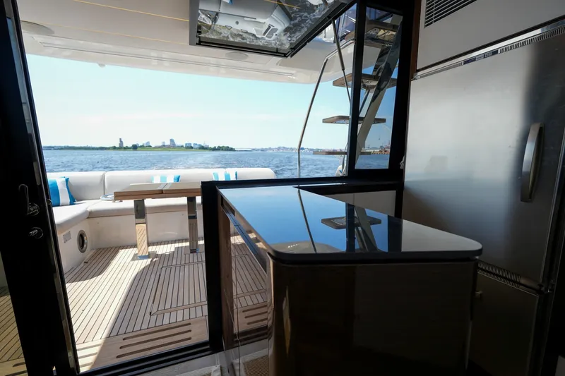Slide: The Image of Luxurious interior of 2023 Prestige 590 yacht with ocean view and modern amenities. - 60