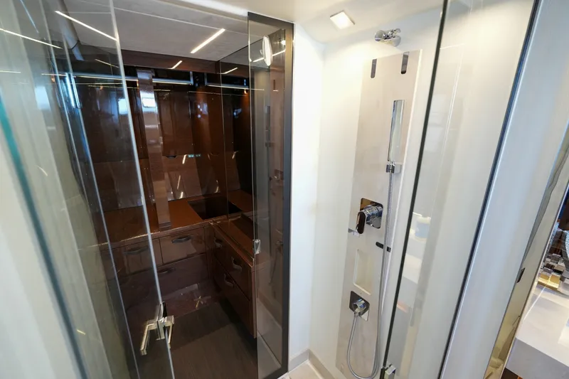 Slide: The Image of Luxurious bathroom interior of 2023 Prestige 590 yacht with modern shower design. - 97