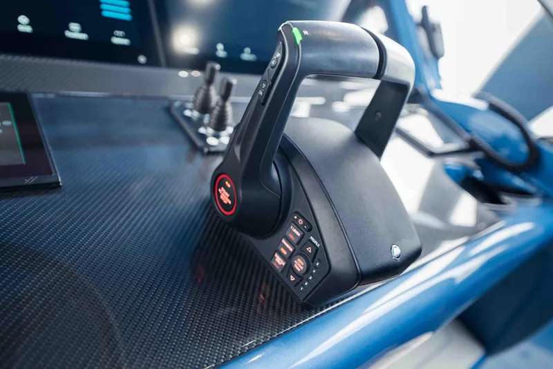 Slide: The Image of Throttle control on 2026 Midnight Express 52 Vitesse yacht dashboard, featuring sleek design and technology. - 33