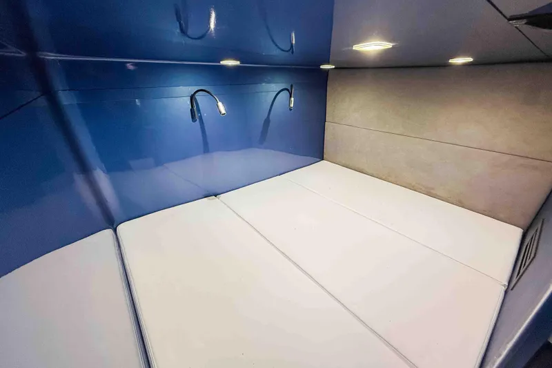 Slide: The Image of Luxurious cabin interior of 2026 Midnight Express 52 Vitesse with modern lighting and sleek design. - 51