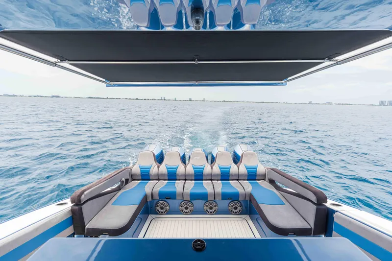 Slide: The Image of Luxury Midnight Express 52 Vitesse boat interior, 2026 model, cruising on open water. - 37