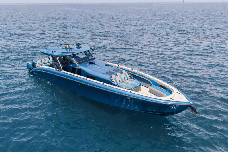 Slide: The Image of Luxurious 2026 Midnight Express 52 Vitesse yacht cruising on open sea. - 11