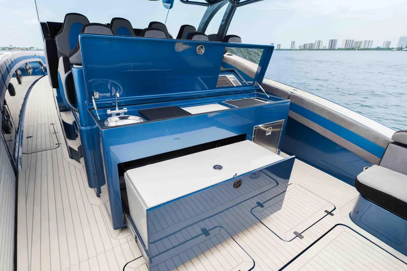 Slide: The Image of Luxurious 2026 Midnight Express 52 Vitesse yacht interior with sleek blue design and modern amenities. - 34