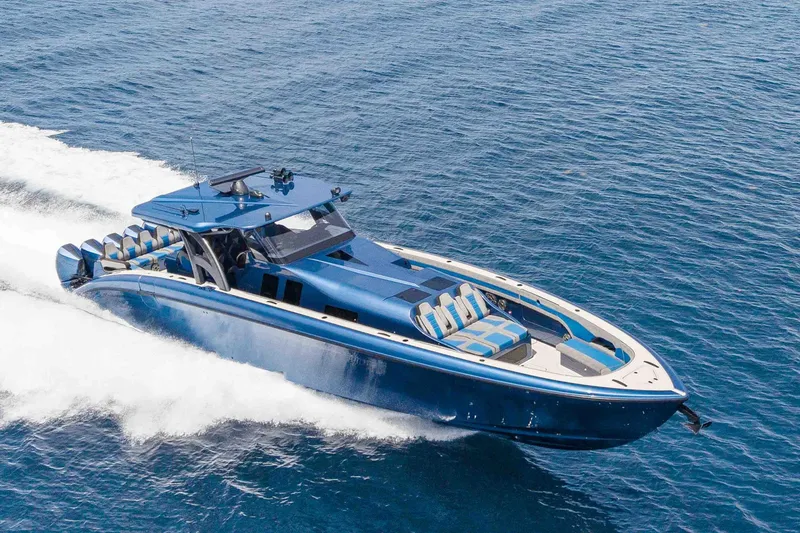 Slide: The Image of 2026 Midnight Express 52 Vitesse luxury yacht cruising on open water. - 3
