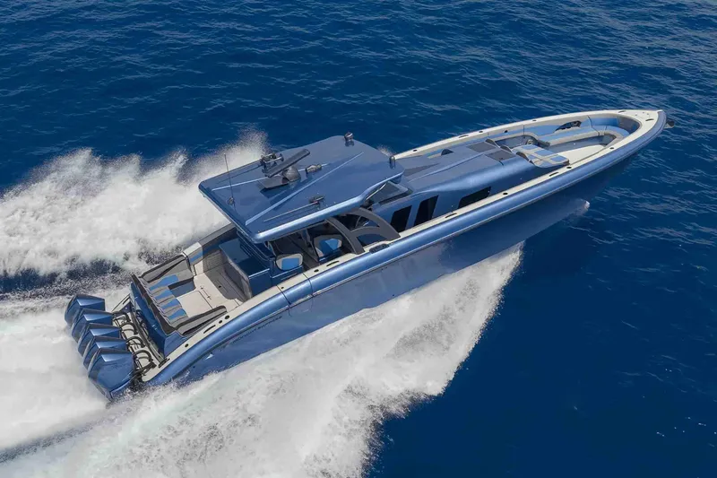 Slide: The Image of 2026 Midnight Express 52 Vitesse luxury speedboat cruising on open blue waters. - 0