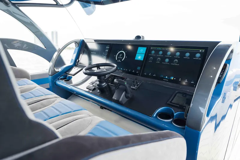 Slide: The Image of Interior cockpit of 2026 Midnight Express 52 Vitesse with advanced digital controls. - 30