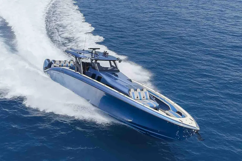 The Image of A sleek 2026 Midnight Express 52 Vitesse yacht cruising on open blue waters. - 1