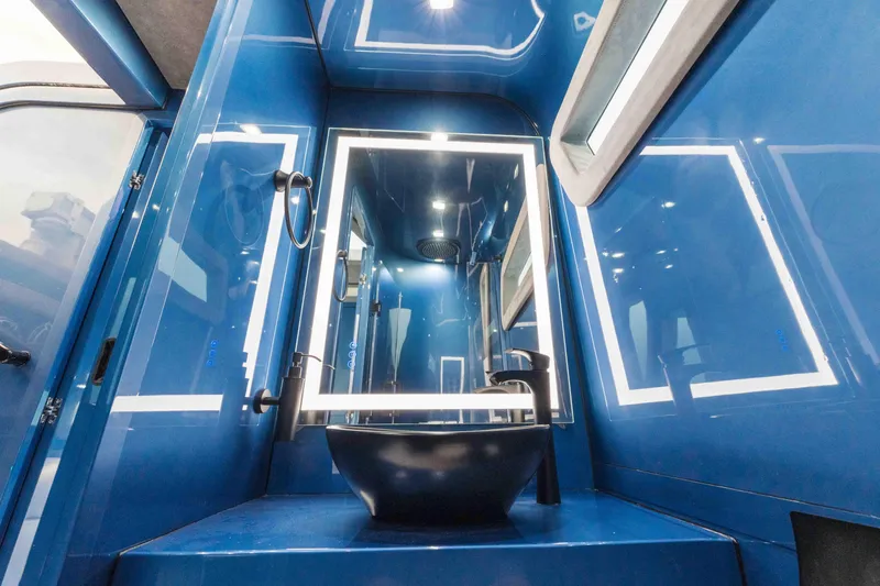 Slide: The Image of Luxurious blue bathroom interior of 2026 Midnight Express 52 Vitesse yacht. - 47