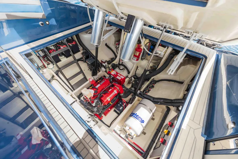 Slide: The Image of Engine compartment of 2026 Midnight Express 52 Vitesse, showcasing advanced marine engineering. - 52