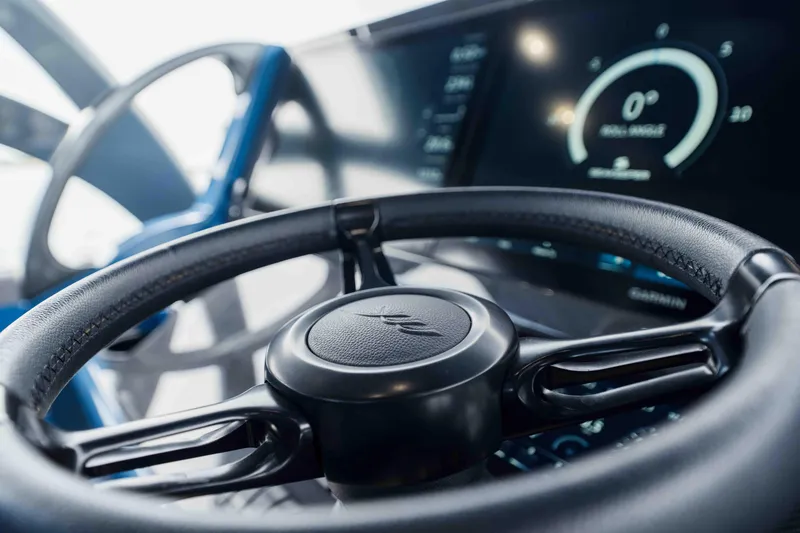 Slide: The Image of Steering wheel and dashboard of 2026 Midnight Express 52 Vitesse boat. - 32