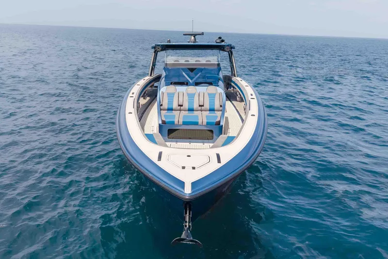 Slide: The Image of 2026 Midnight Express 52 Vitesse luxury boat on open sea, showcasing sleek design. - 10