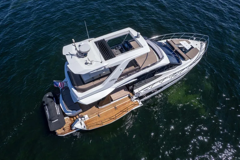 Slide: The Image of Aerial view of 2021 Galeon 500 Fly yacht on open water. - 12