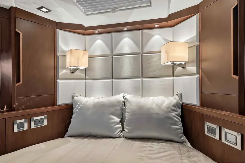 Slide: The Image of Luxurious interior cabin of 2021 Galeon 500 Fly yacht with elegant lighting and plush bedding. - 72