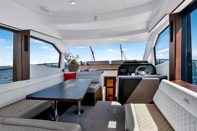 Slide: The Image of Luxurious interior of 2021 Galeon 500 Fly yacht with elegant seating and helm. - 60