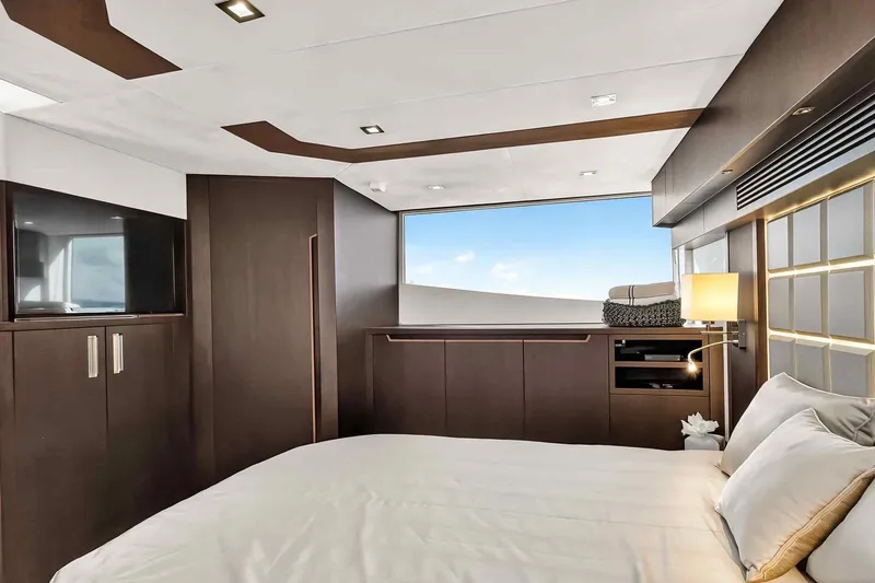 Slide: The Image of Luxurious bedroom interior of 2021 Galeon 500 Fly yacht with modern design elements. - 82