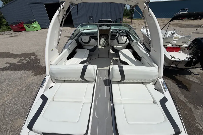 Slide: The Image of 2020 Regal 2300 Bowrider boat with spacious seating and sleek design. - 2