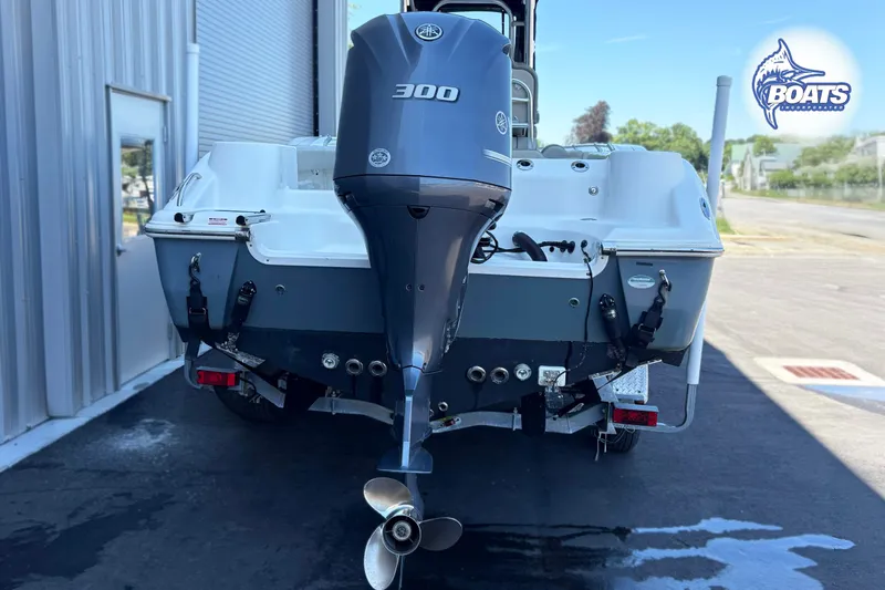 Slide: The Image of 2021 Key West 244 Center Console boat with Yamaha 300 outboard motor, rear view. - 12