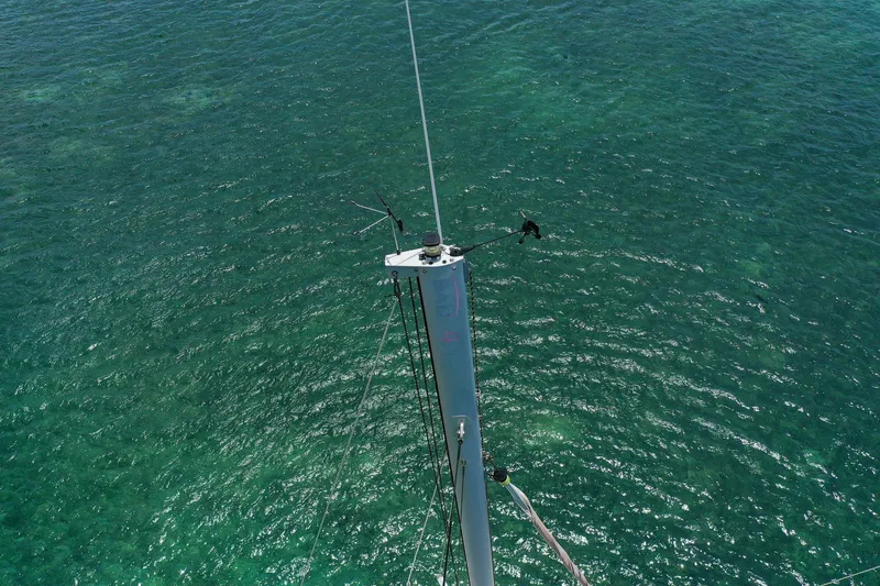 Slide: The Image of Aerial view of Bali 4.1 sailboat mast over clear turquoise water, 2020 model. - 35