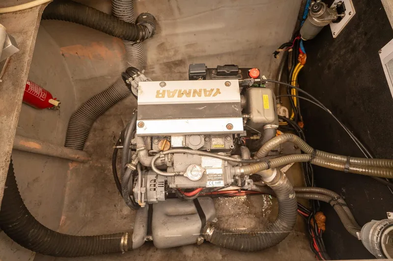 Slide: The Image of Engine compartment of a 2020 Bali 4.1 boat, featuring a Yanmar engine. - 40