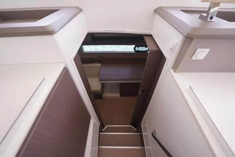 Slide: The Image of Interior view of a 2020 Bali 4.1 yacht, featuring modern design and wooden accents. - 11