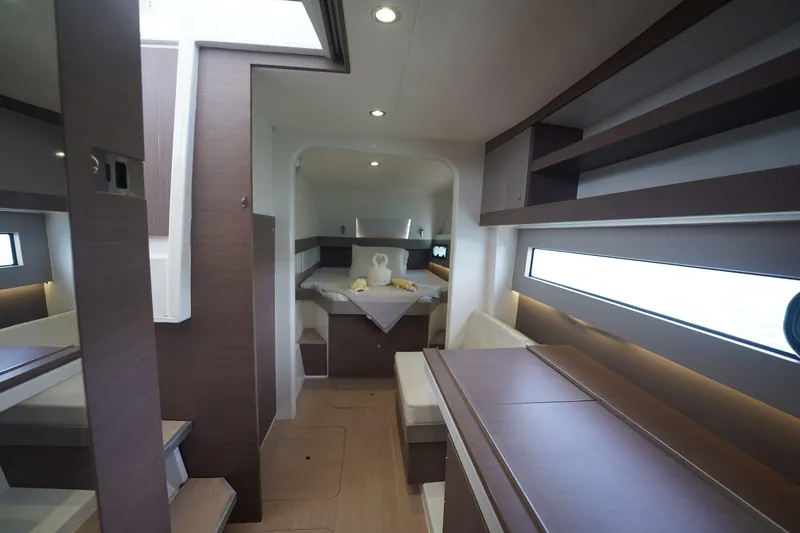 Slide: The Image of Luxurious interior of a 2020 Bali 4.1 yacht, featuring modern design and cozy sleeping area. - 10