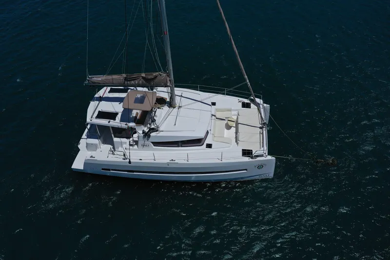 Slide: The Image of Aerial view of 2020 Bali 4.1 catamaran sailing on open water. - 5