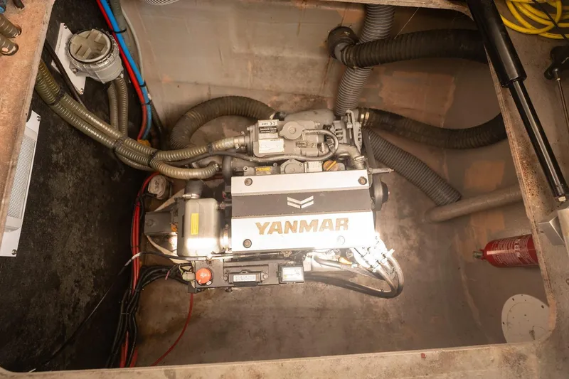 Slide: The Image of Engine compartment of a 2020 Bali 4.1 with Yanmar engine and visible wiring. - 41