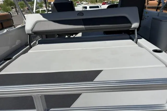 Slide: The Image of 2026 Sun Tracker Party Barge 22 RF DLX pontoon boat with spacious seating area. - 2