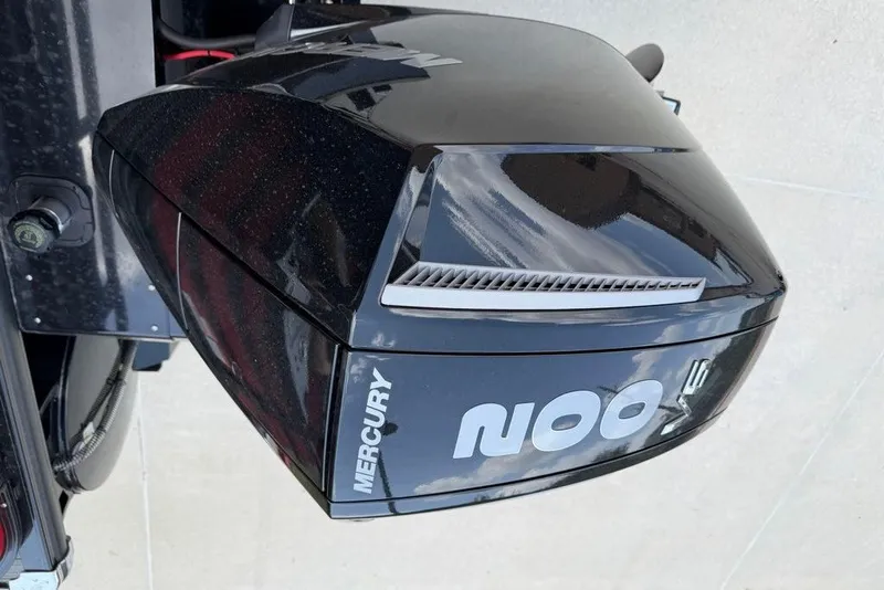 Slide: The Image of Mercury 100 V6 engine on 2026 Ranger 223F boat, sleek black design. - 12