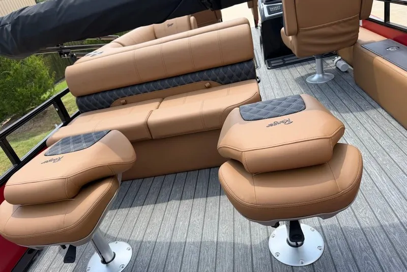 Slide: The Image of Luxurious interior of 2026 Ranger 223F boat with tan leather seating. - 6