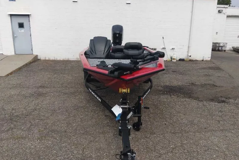 Slide: The Image of 2026 Tracker Pro Team 175 Crappie Edition boat parked on pavement. - 6