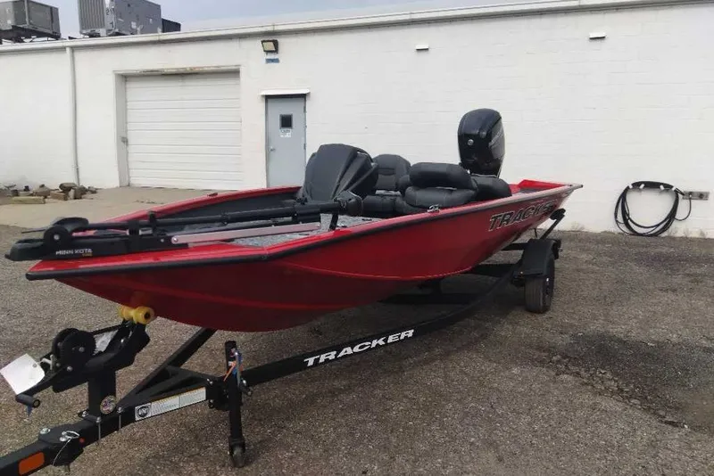 Slide: The Image of 2026 Tracker Pro Team 175 Crappie Edition boat on trailer, parked outdoors. - 3