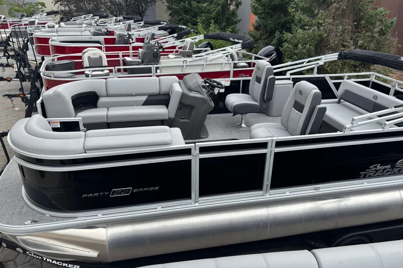 The Image of 2026 Sun Tracker Party Barge 22 RF XP3 pontoon boat with spacious seating and sleek design. - 0