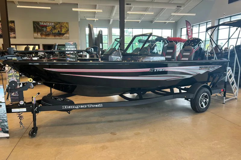 The Image of 2026 Ranger VS1782SC Angler boat displayed indoors on a trailer. - 0