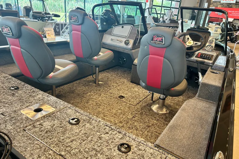 Slide: The Image of Interior of a 2026 Ranger VS1782SC Angler boat with plush seating and modern dashboard. - 6