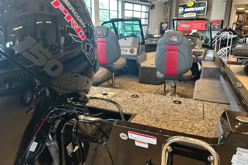 Slide: The Image of 2026 Ranger VS1782SC Angler boat interior with Mercury Pro XS engine in showroom. - 5
