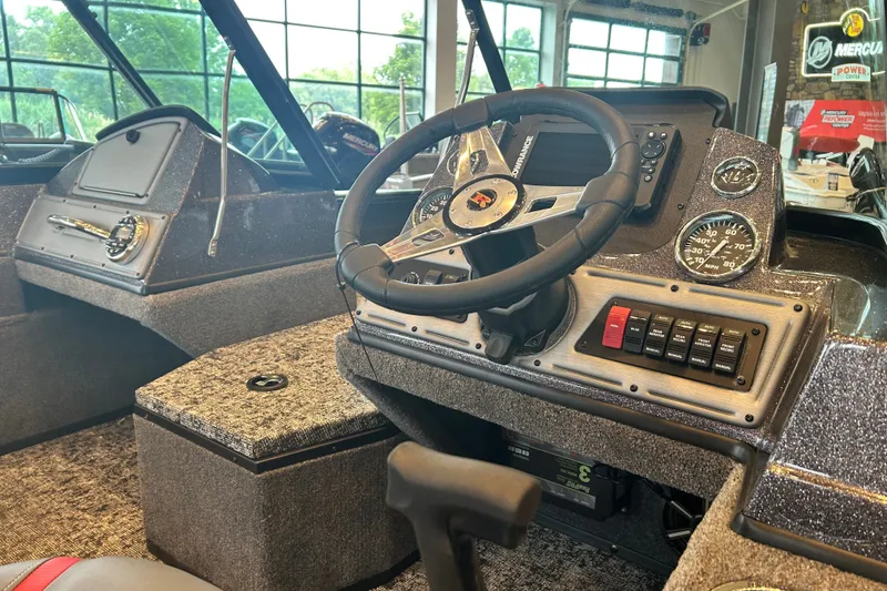Slide: The Image of 2026 Ranger VS1782SC Angler boat interior with steering wheel and control panel. - 7