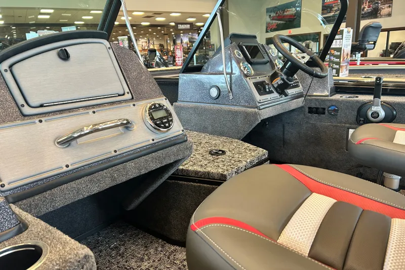 Slide: The Image of Interior of 2026 Ranger VS1782SC Angler boat, featuring modern dashboard and seating. - 3