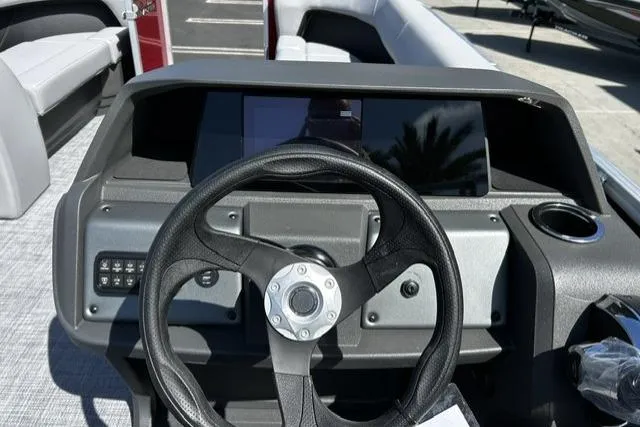 Slide: The Image of Steering console of 2026 Sun Tracker Party Barge 18 DLX pontoon boat. - 8