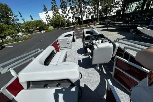 Slide: The Image of 2026 Sun Tracker Party Barge 18 DLX pontoon boat with spacious seating and modern design. - 9