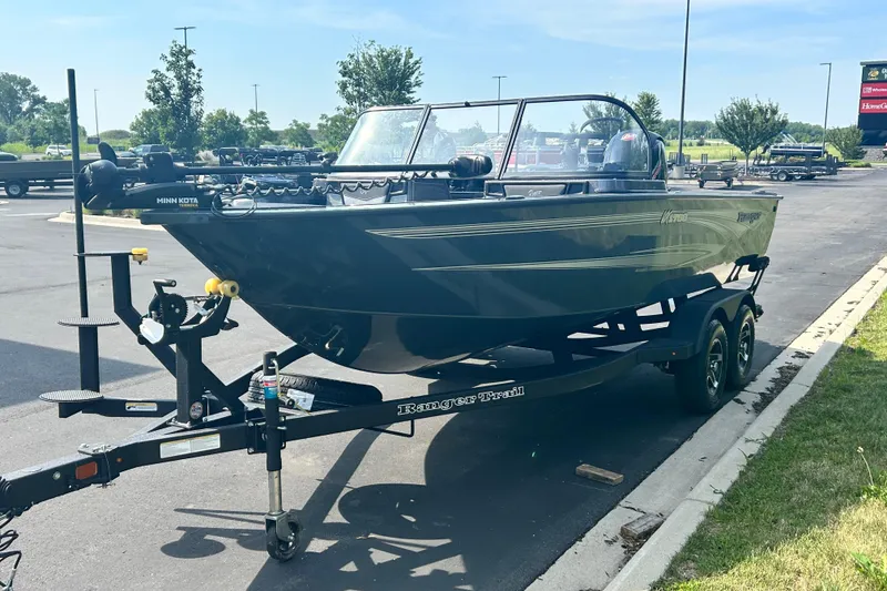 Slide: The Image of 2026 Ranger VX1788 WT boat on trailer in parking lot, sunny day. - 9