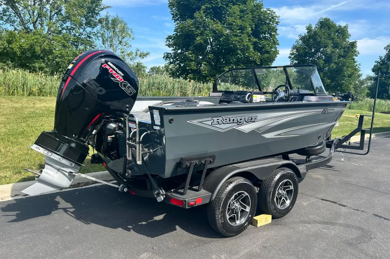 Slide: The Image of 2026 Ranger VX1788 WT boat with Mercury Pro XS engine on trailer, parked outdoors. - 2