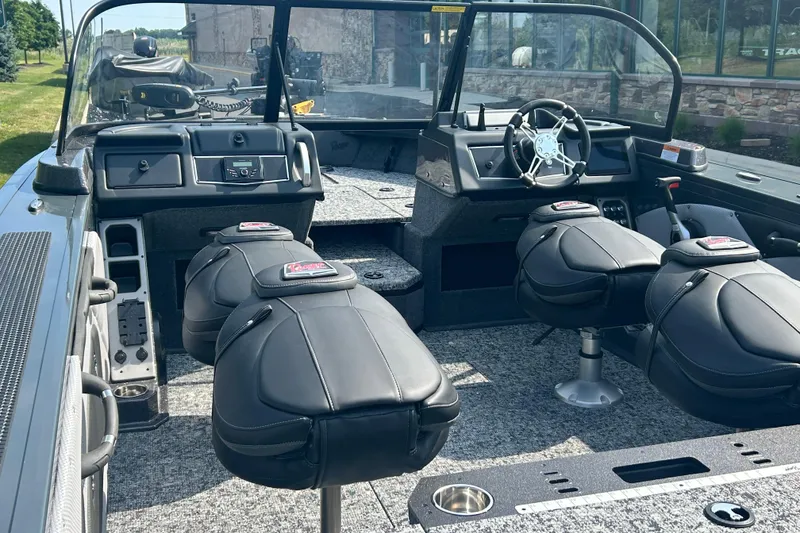 Slide: The Image of 2026 Ranger VX1788 WT boat interior with modern dashboard and comfortable seating. - 13