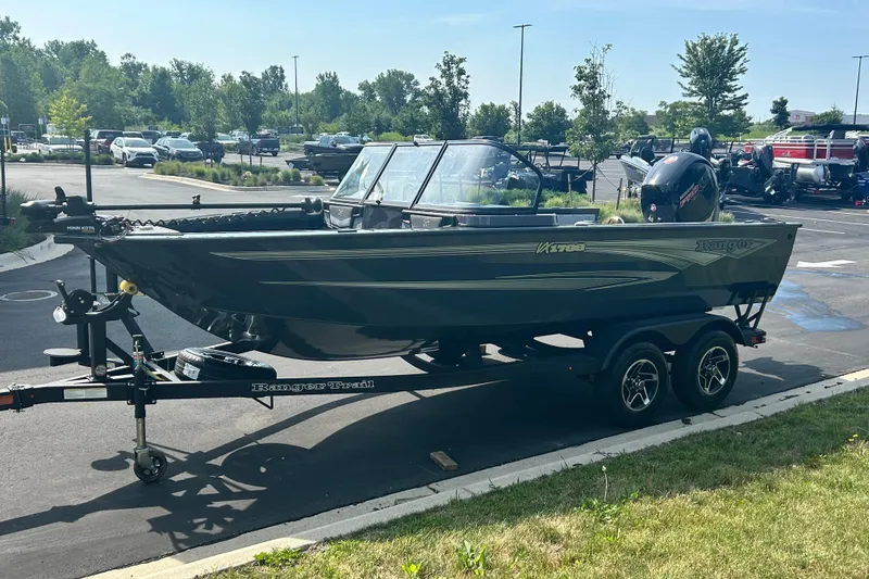Slide: The Image of 2026 Ranger VX1788 WT boat on trailer in parking lot, sunny day. - 10