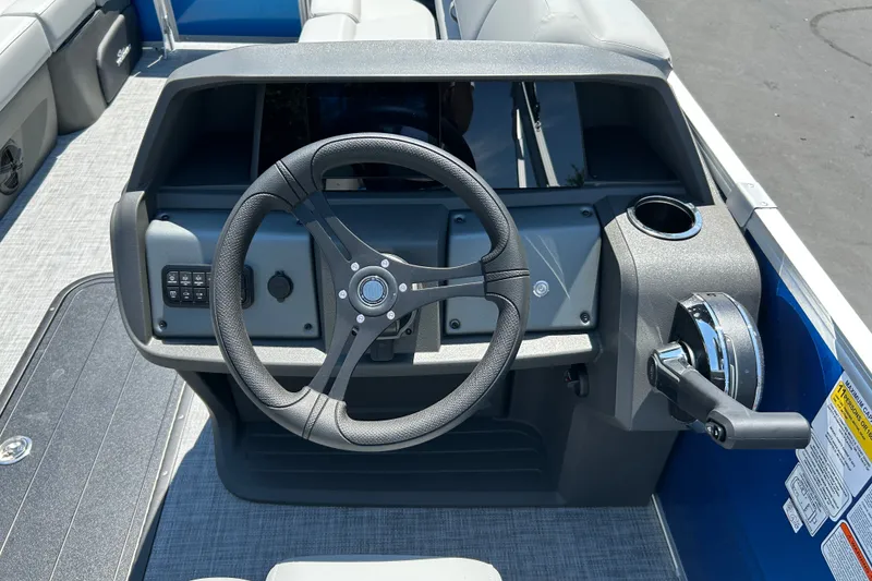 Slide: The Image of Steering console of 2026 Sun Tracker Party Barge 22 RF XP3 pontoon boat. - 24
